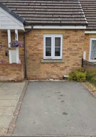 Before: a faded, stained grey tarmac driveway
